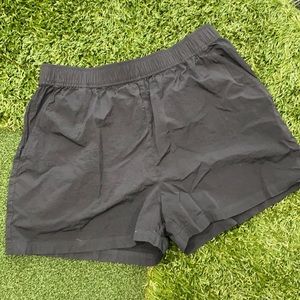 TNA black “windbreaker type” shorts